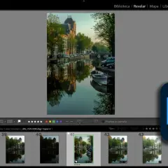 Interfaz de Adobe Lightroom Classic. Se muestra una foto de un canal con reflejos y edificios. El panel de ajustes revela qué es Lightroom: una herramienta para editar imágenes.