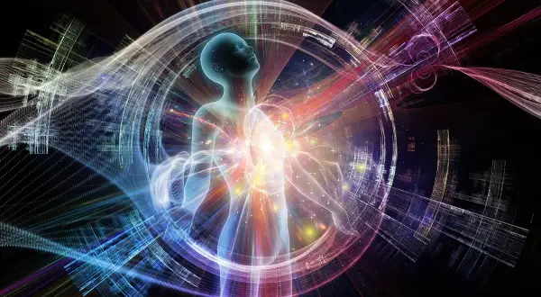 Silueta humana rodeada de energía cósmica y luz vibrante. Inspiración para frases sobre luz y la conexión universal.