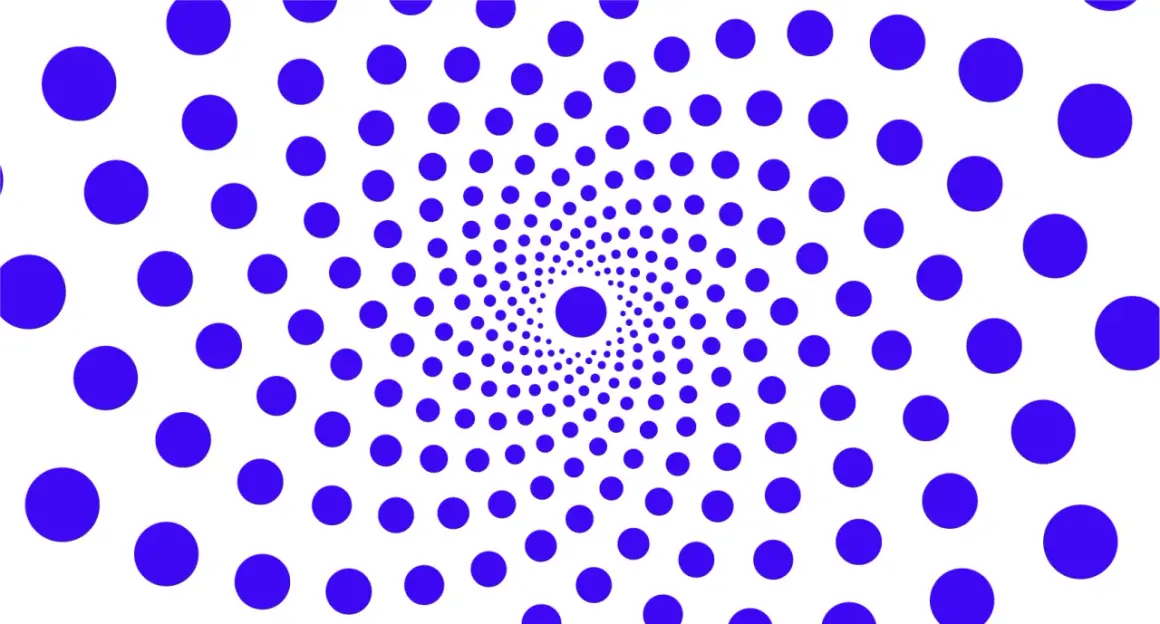 Círculos azules dispuestos en espiral, un ejemplo visual de la ley de semejanza, creando un efecto hipnótico.