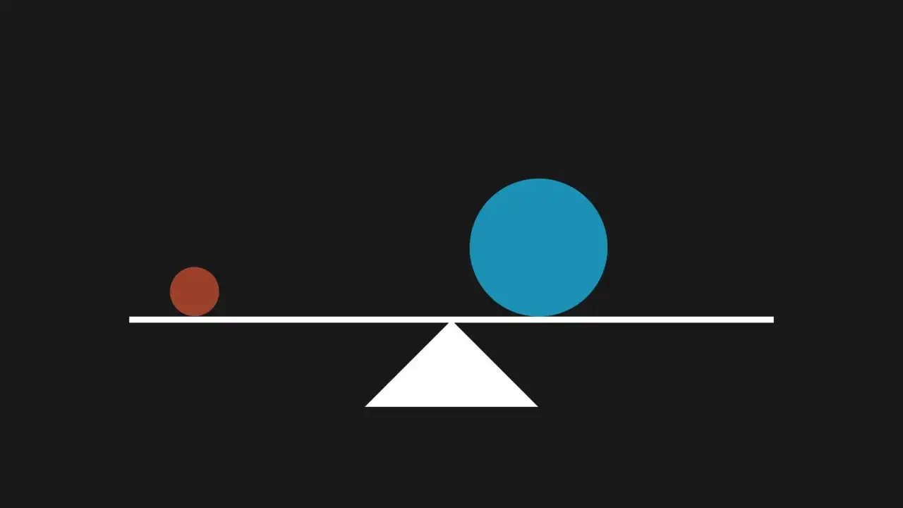 Balanza con una esfera roja peque&ntilde;a y una azul grande, ilustrando el peso visual.