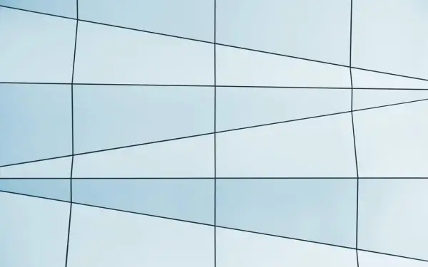 Patrón abstracto de **imágenes geométricas** con líneas negras sobre paneles de vidrio azul claro, creando un diseño moderno y minimalista.
